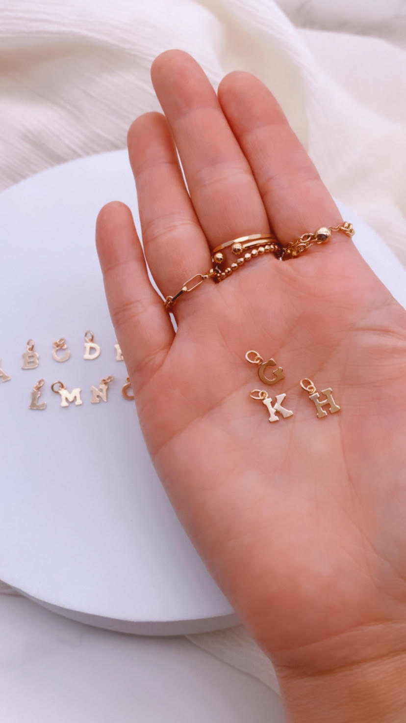 Cut out INITIAL Charm